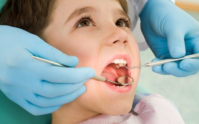 Child getting dental care