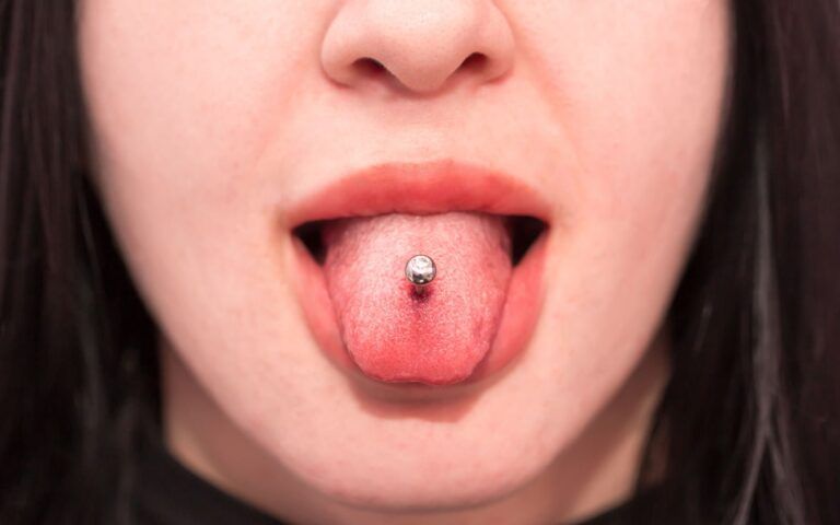 Young Woman with Tongue Piercing