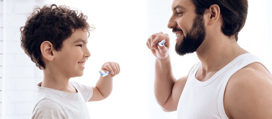 Father and Child Brushing