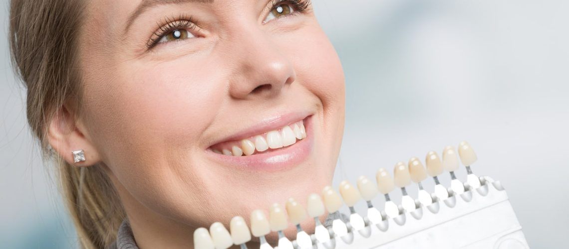Woman Picking Shades For Veneers